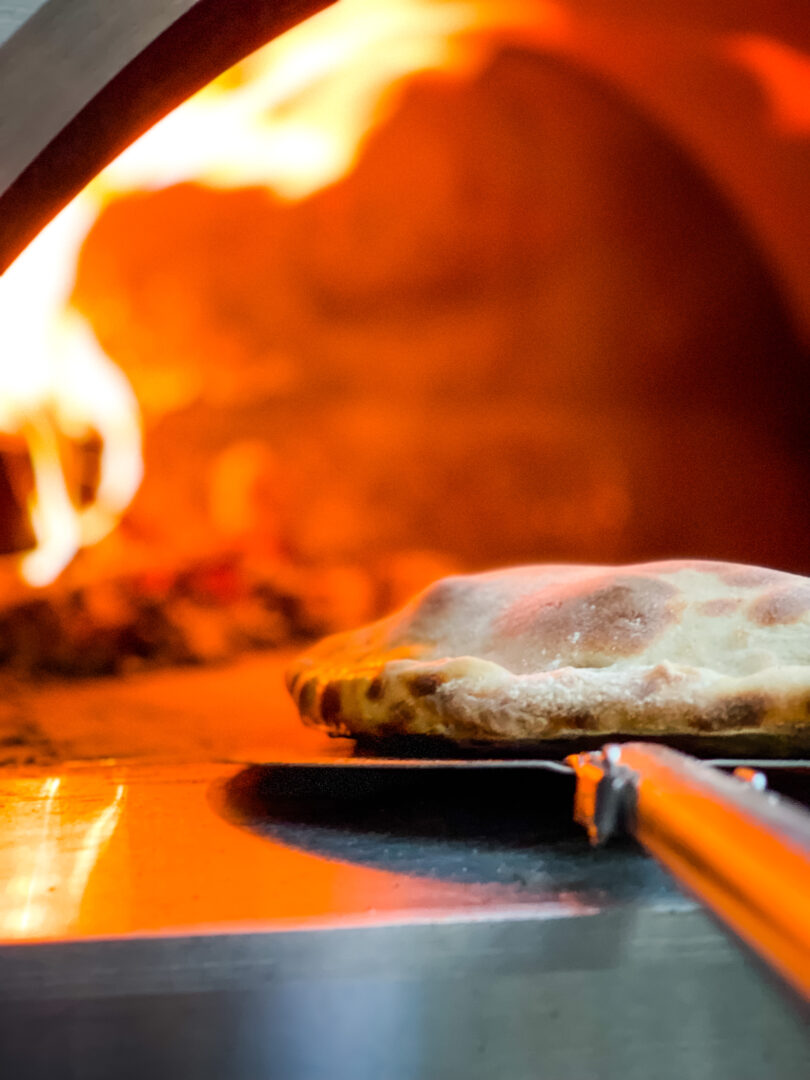 placing the focaccia in the oven